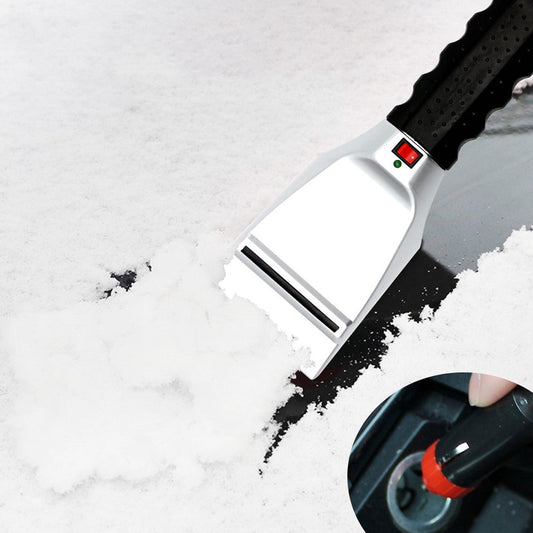 Heatable snow removal shovel for vehicle